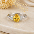Aurelia Canary Ring – Silver Ring with Yellow Center Stone & Crystal Side Stones