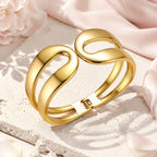 Élan Sculptural Cuff Bracelet – Gold Open-Swirl Statement Bracelet